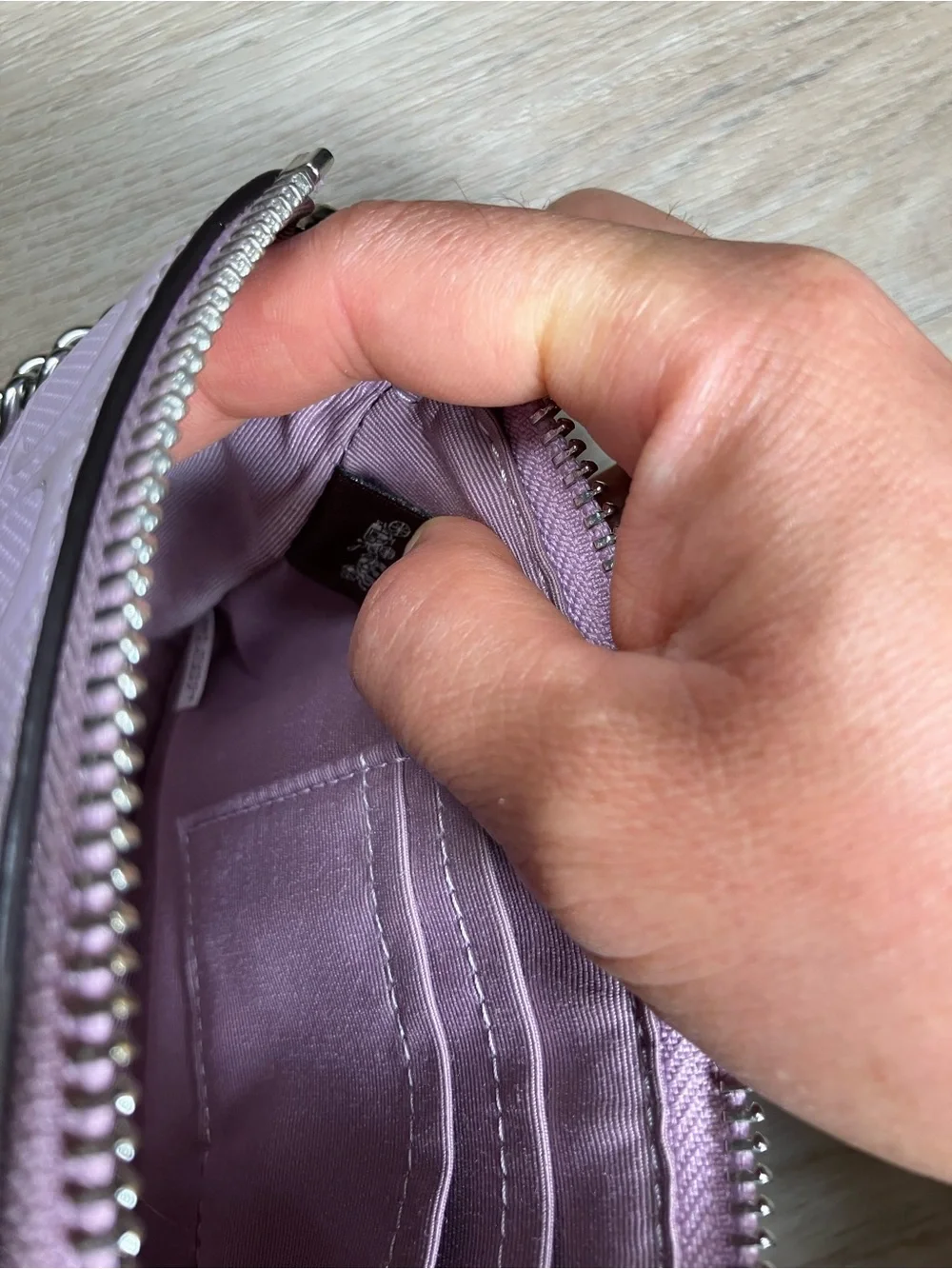 Coach lavender embossed